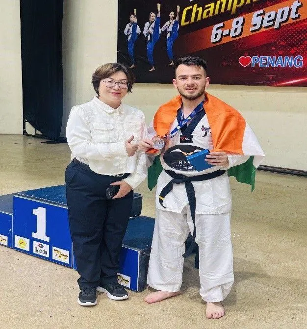 MBA student Numair Shabir Shah of USMS, secured a silver medal at the 16th CK Classic International Taekwondo Championship held in Kuala Lumpur, Malaysia, demonstrating exceptional dedication, skill, perseverance, and bringing pride to the institution.